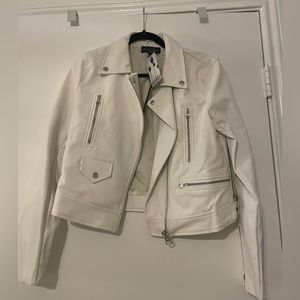 White faux leather moto jacket.